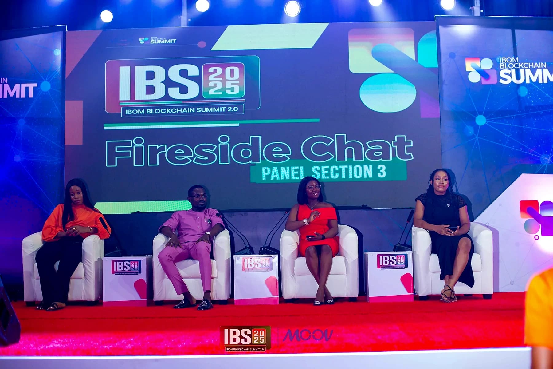 An IBX fireside panel on the summit stage